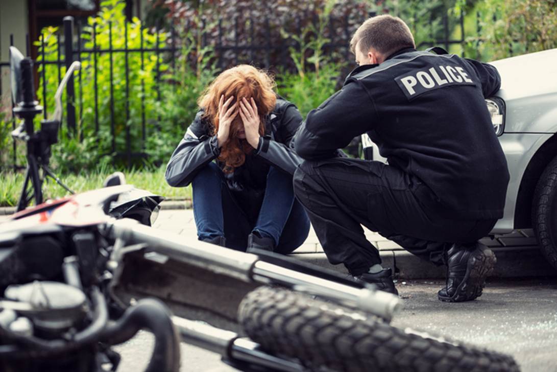 A person kneeling next to a person holding her face

AI-generated content may be incorrect.